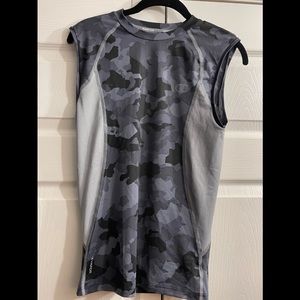 Grey/black/white sleeveless athletic top. Great condition 8/10.